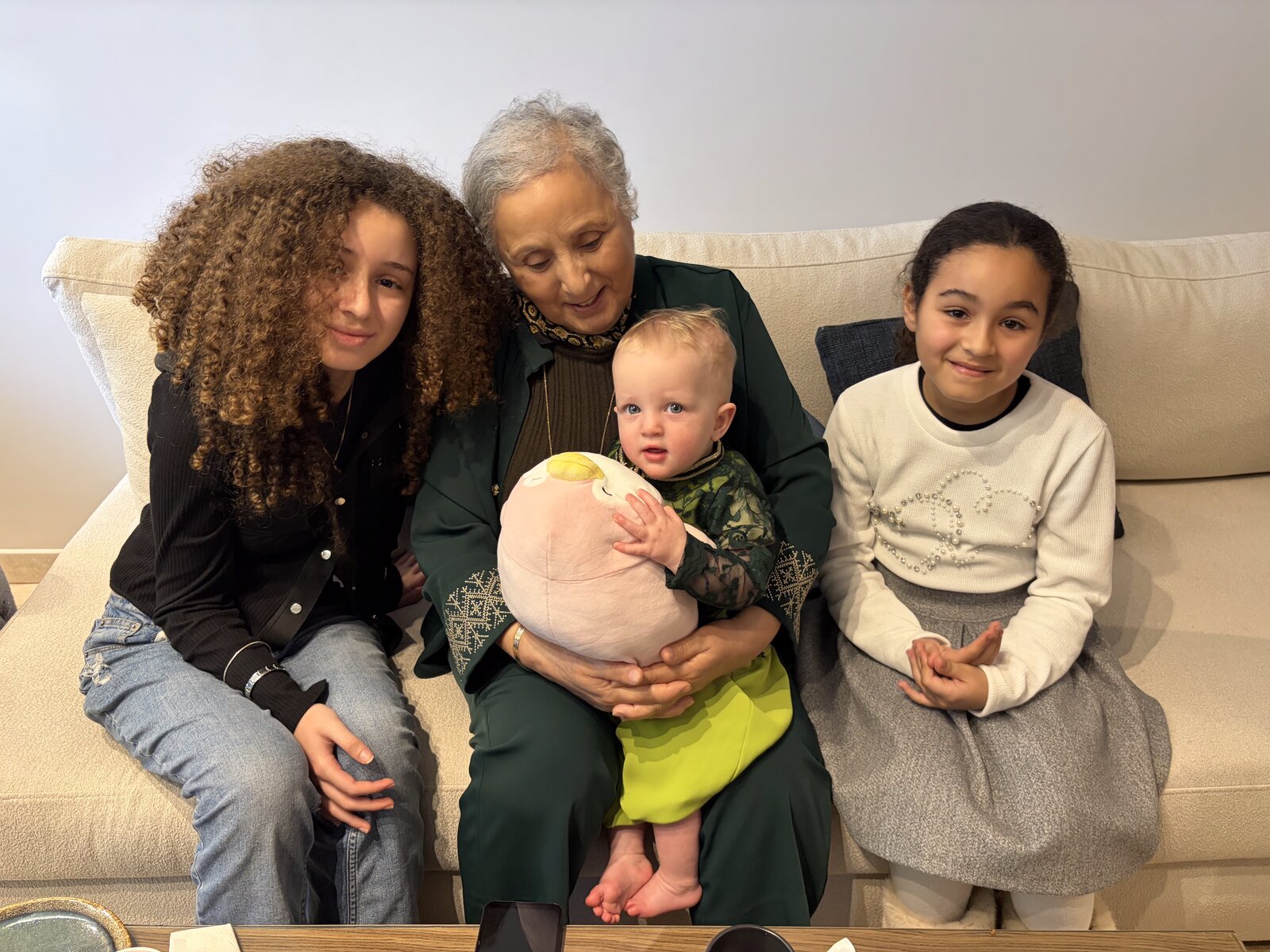 Amira with her grandmother and cousins