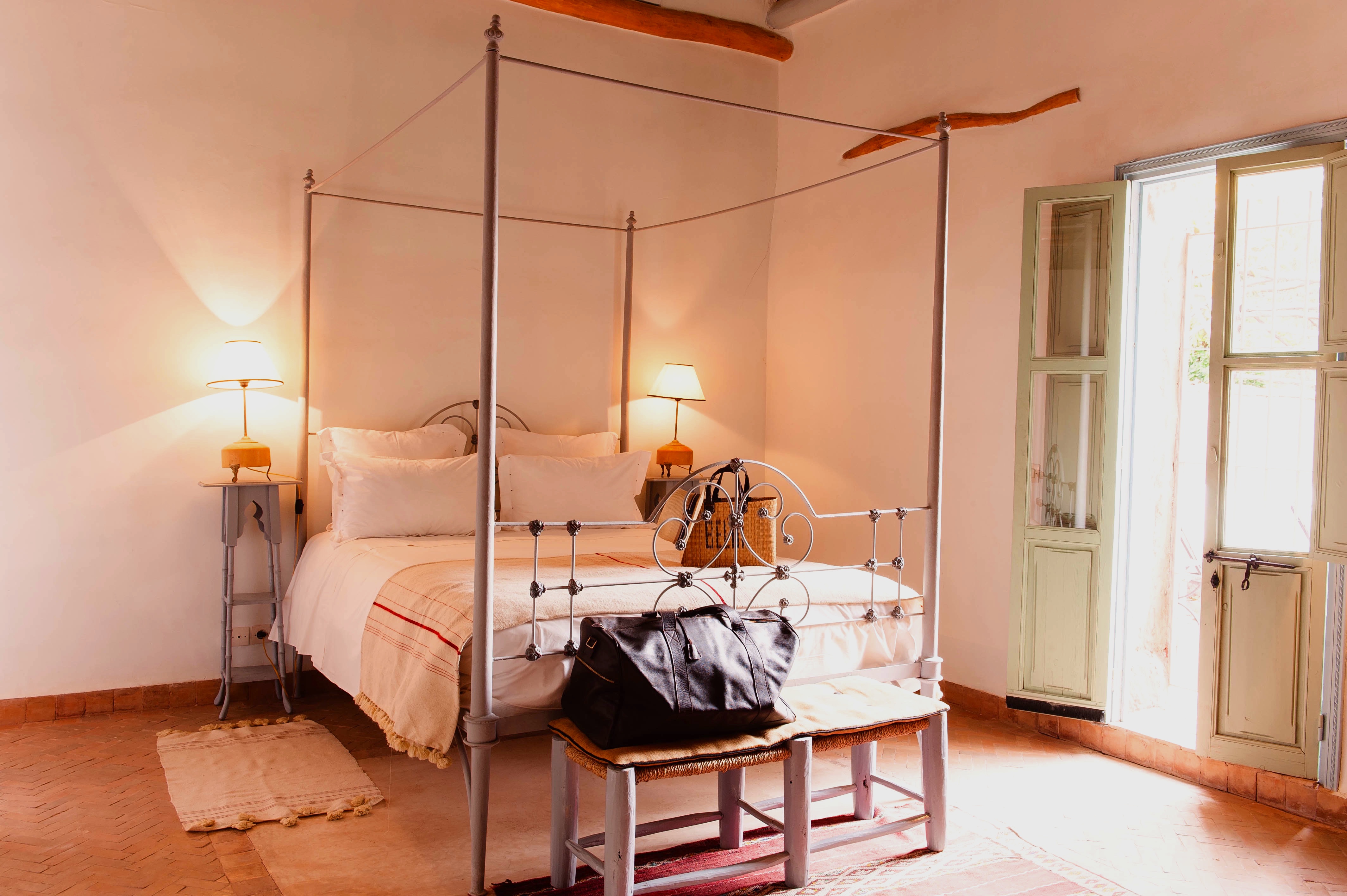 A canopy bed in a Beldi guest room