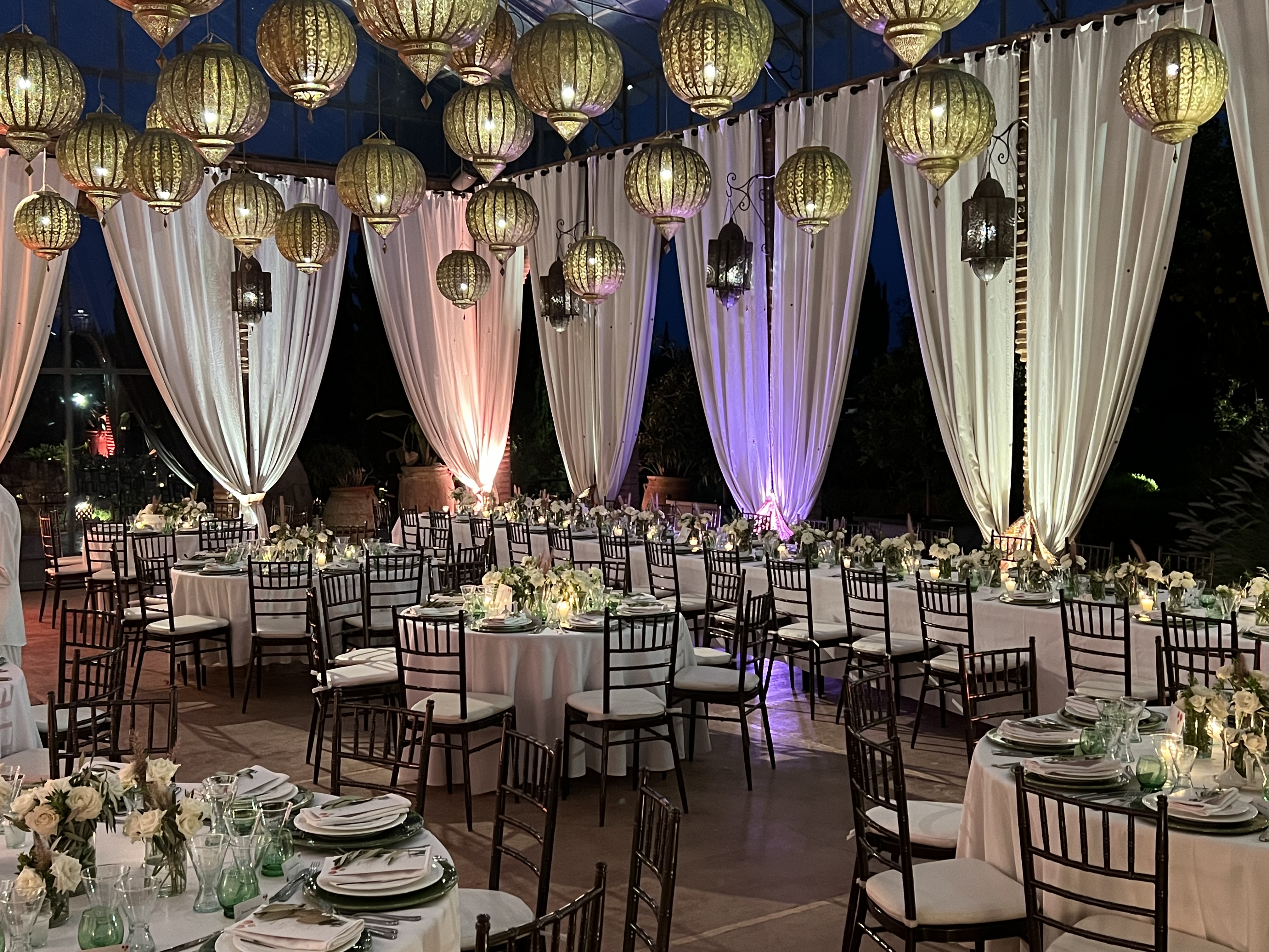 Lanterns and white drapes set for an evening at Beldi